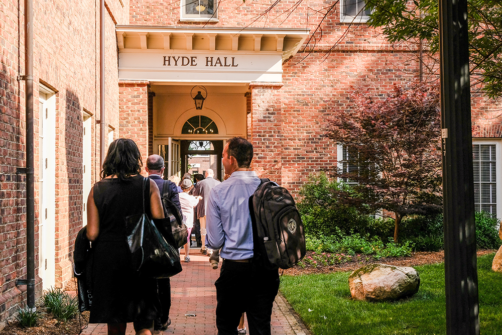 CHCI attendees walk into the Hyde Hall entrance.