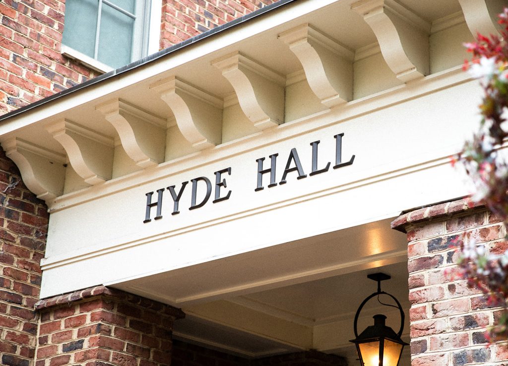 The awning to the campus-facing entrance of Hyde Hall, bearing the building's name.